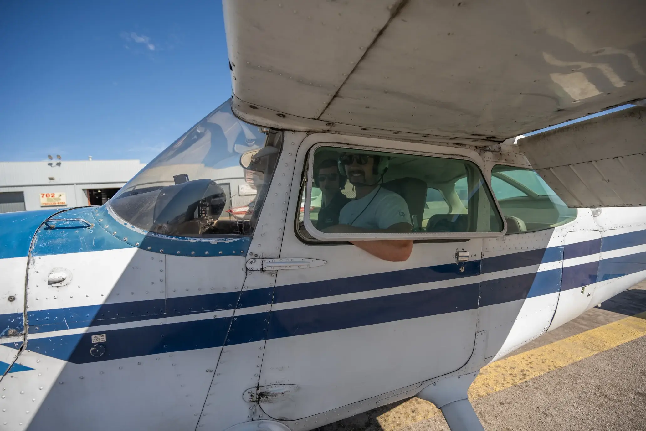 Training aircraft in flight during a Vegas Aviation lesson