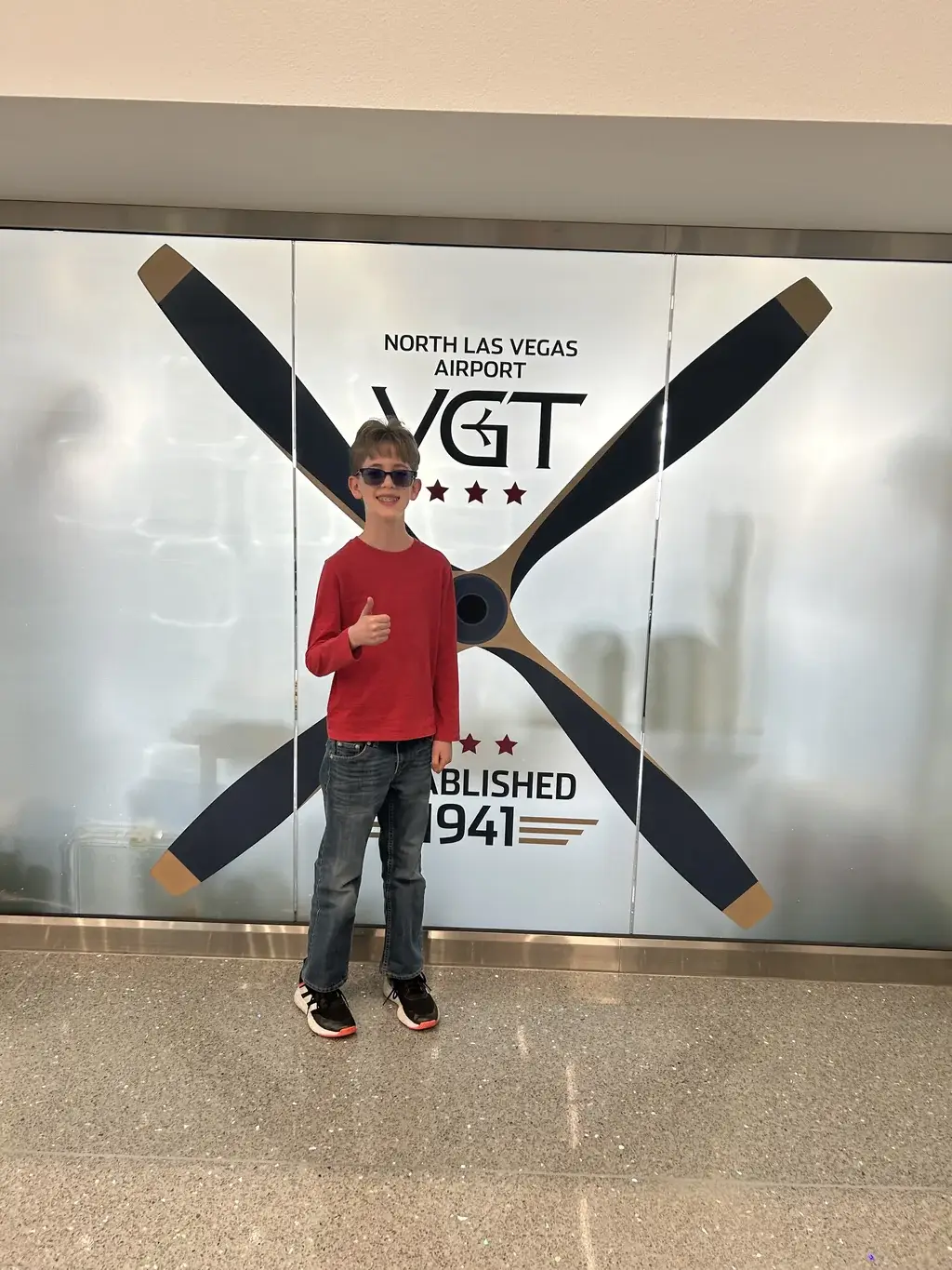 Young Eagles student at an airport display