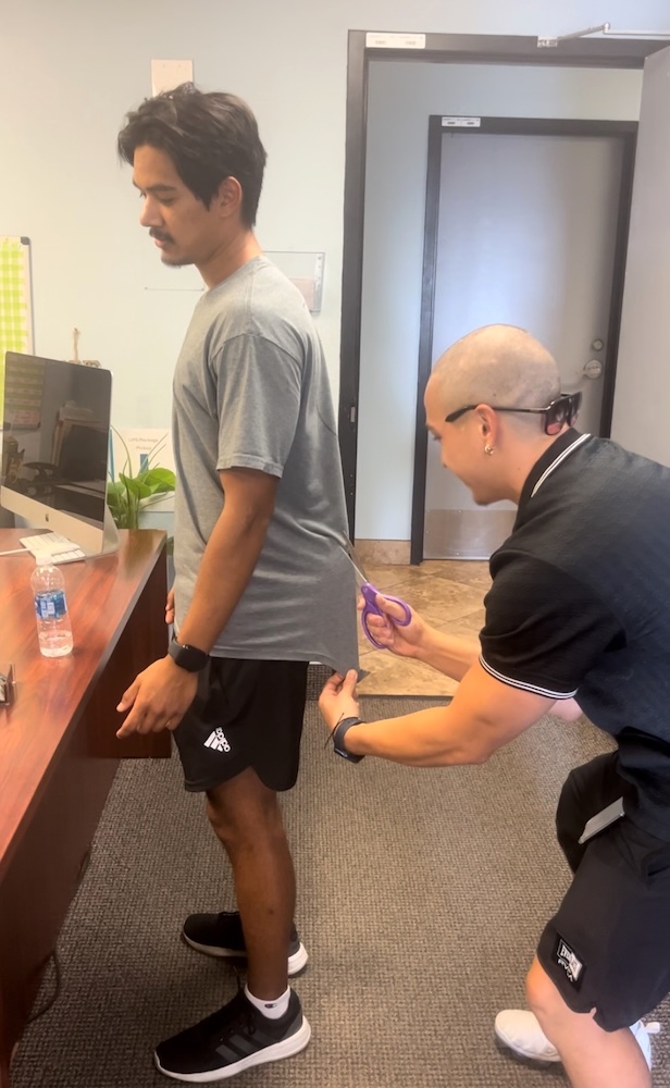 CFI cutting student's shirt after his first solo flight