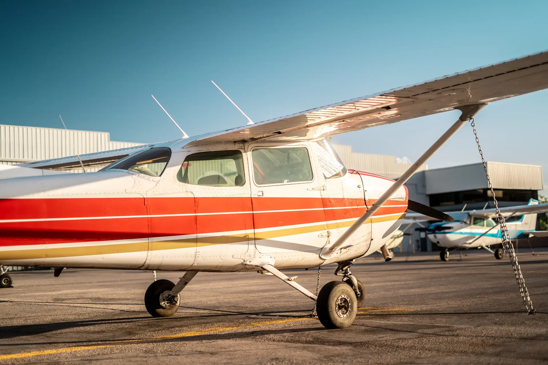 Single-engine airplane parked on the ramp