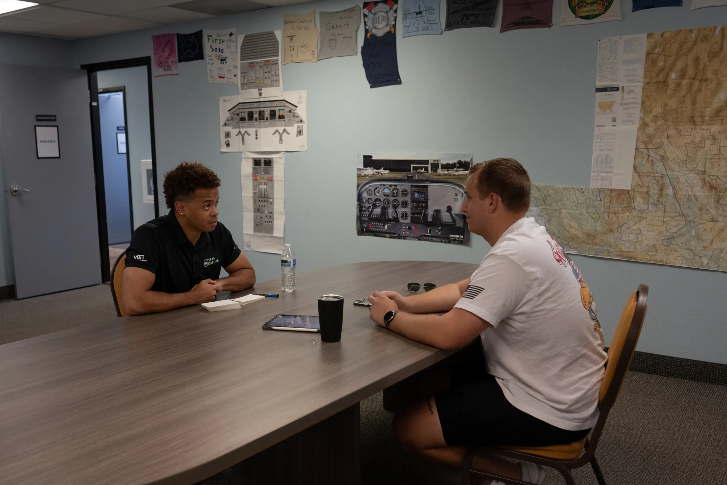 Instructor and student inside office during lesson