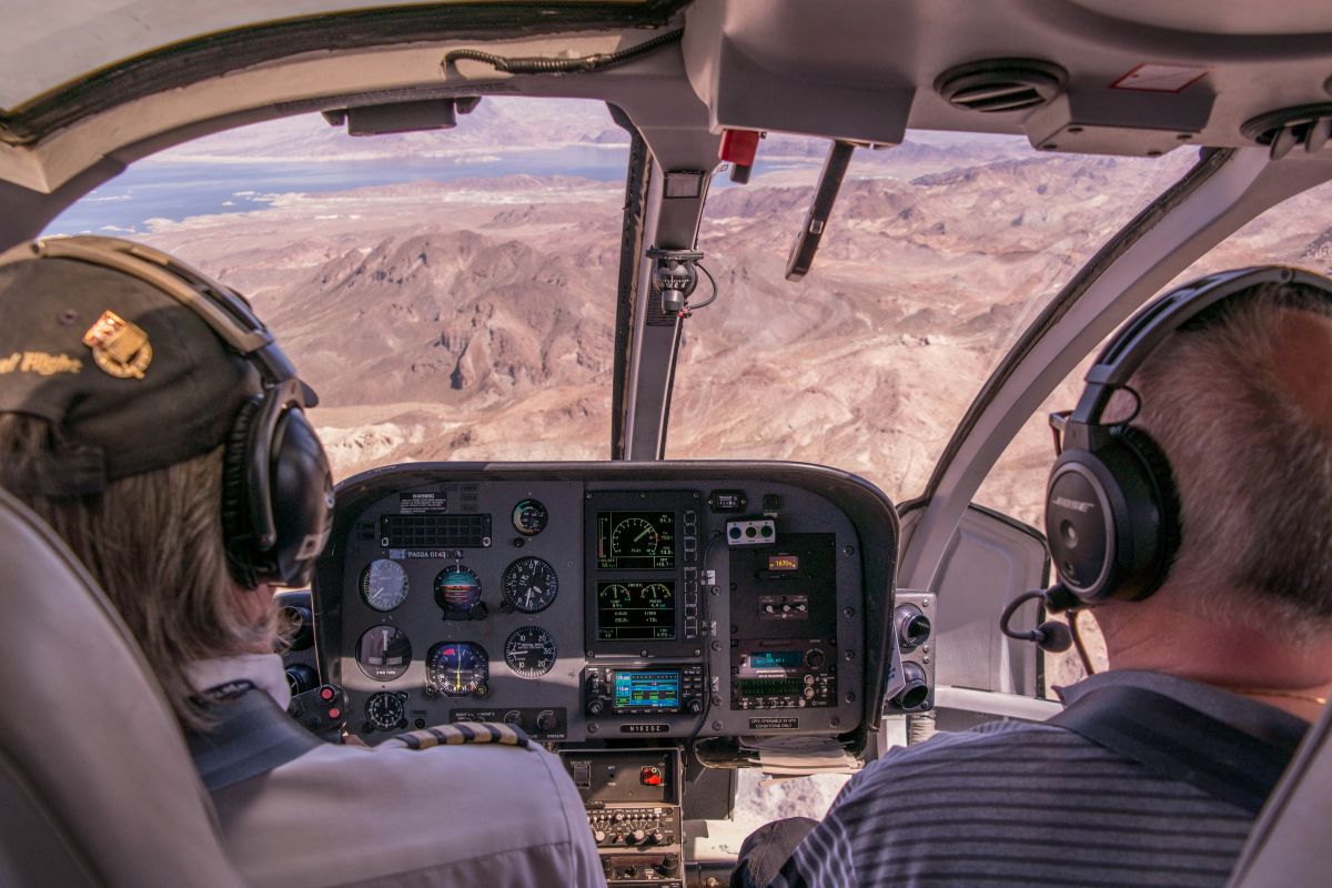 Student pilot and instructor flying over Red Rock Canyon near Las Vegas during training flight.